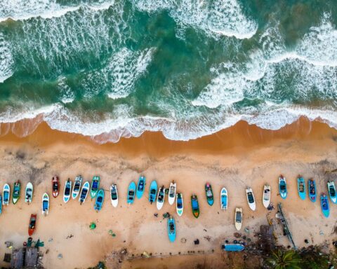 h aerial photography of boats on shore 1998439
