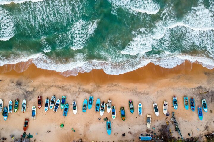 h aerial photography of boats on shore 1998439